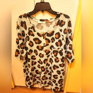 Cherish mint green cheetah print waffle t-shirt.   Fits like a large